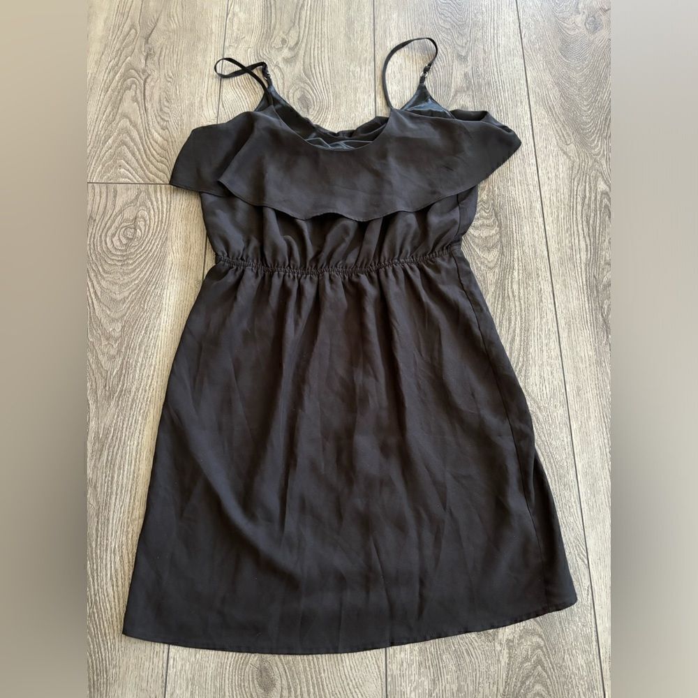 BCBG woman’s mini spaghetti dress used in good condition